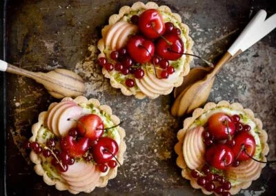 Fruit Tarts with Coconut Pastry Cream & Pistachios