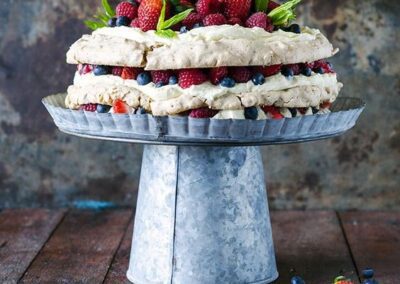 Layered Hazelnut Pavlova with Mascarpone Cream and Berries
